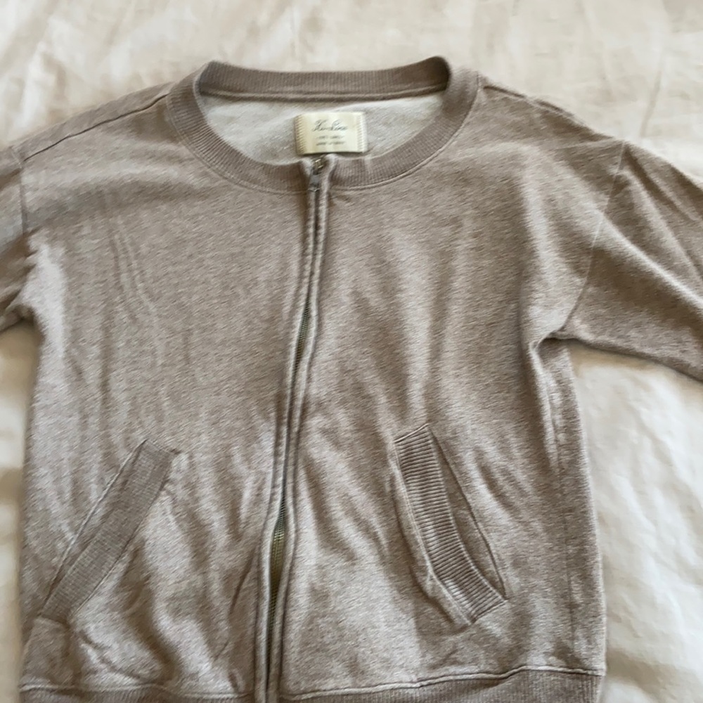 Short sleeved zip up sweatshirt